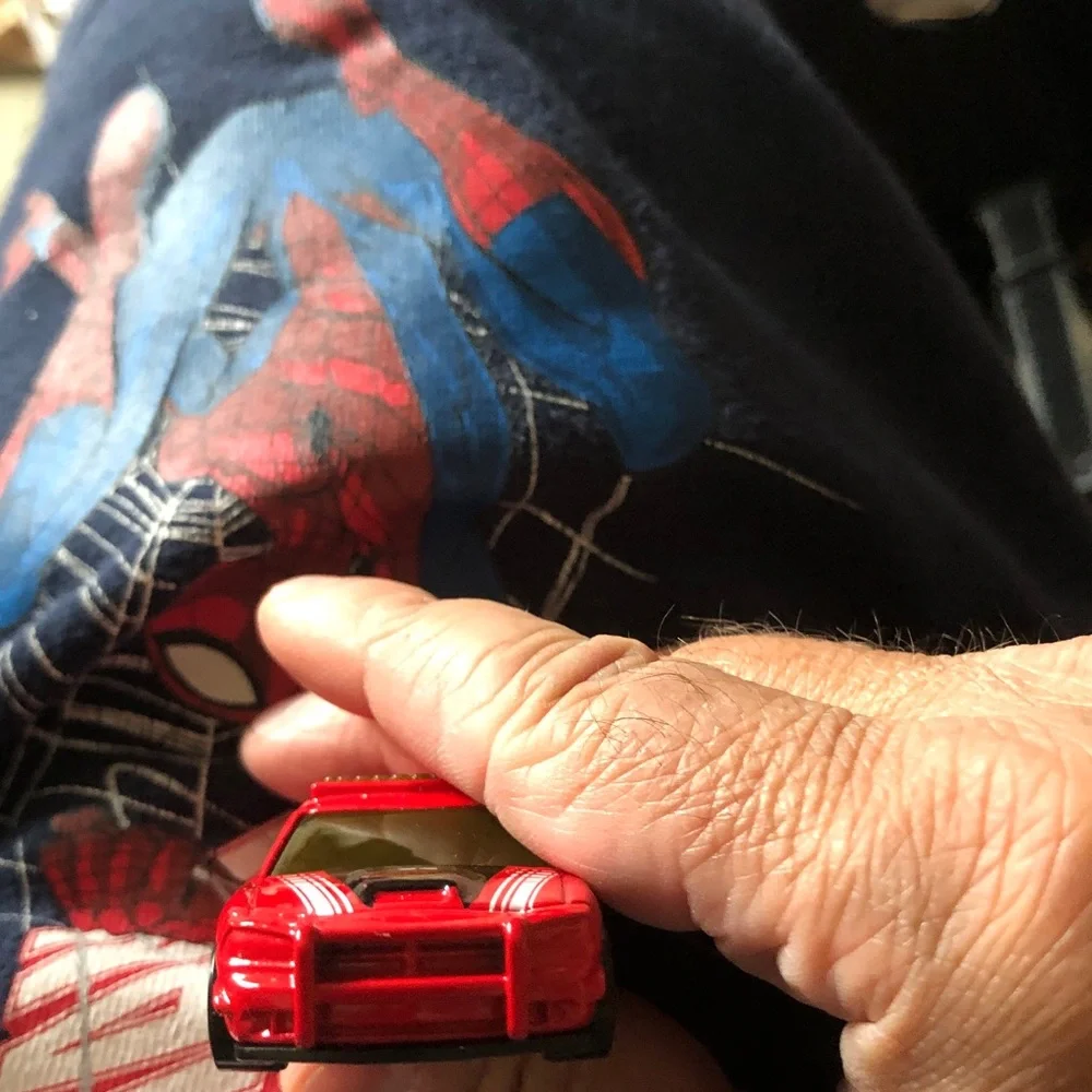 Red Toy Race Car with White Racing Stripes